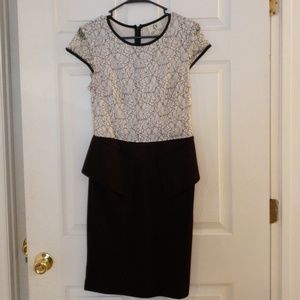 Black, gray and white peplum style dress